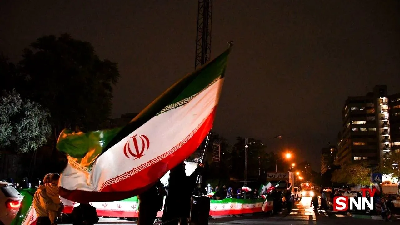 تصویری ماندگار از مادر و نوزاد با پرچم ایران